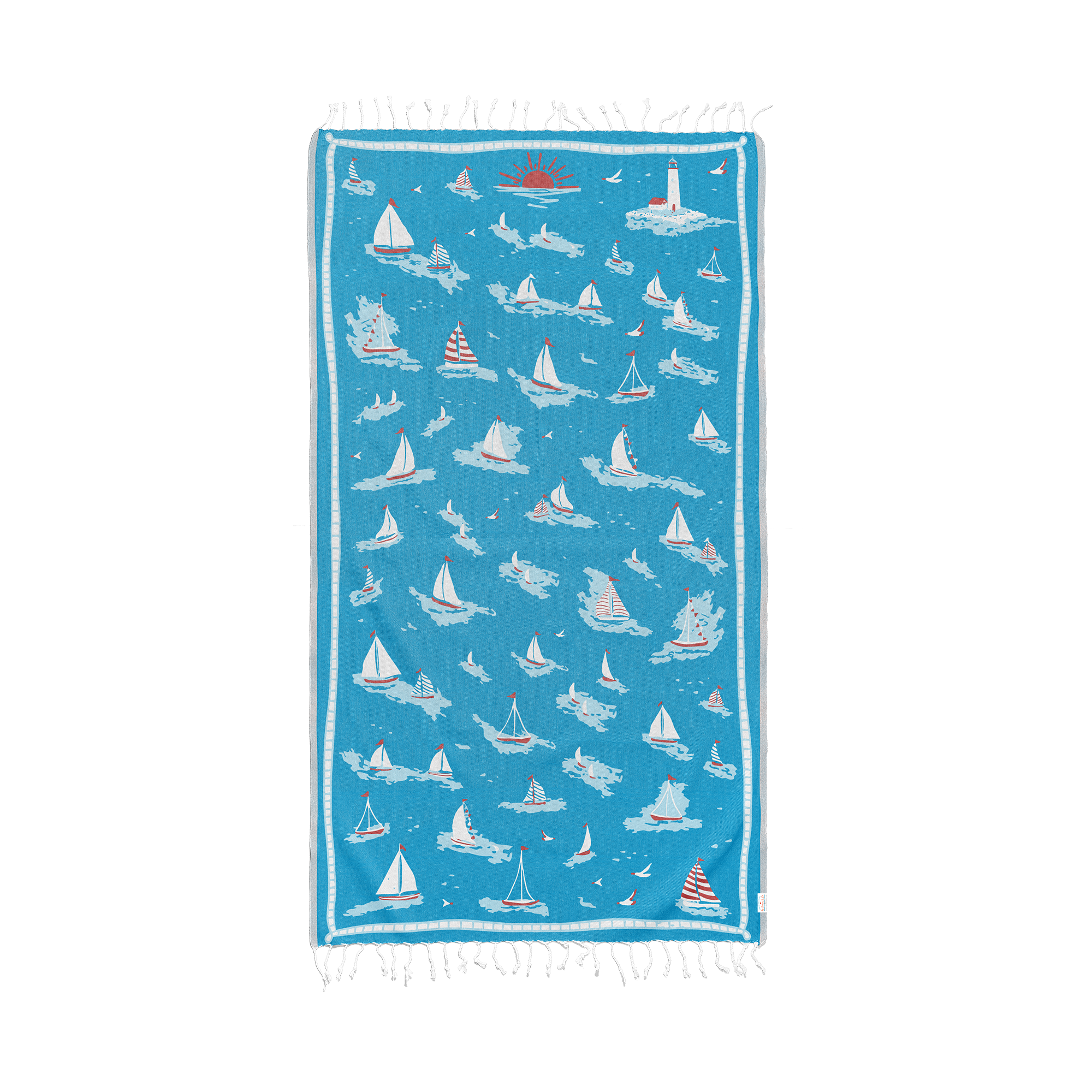 Blue towel with sailboat pattern on a white background